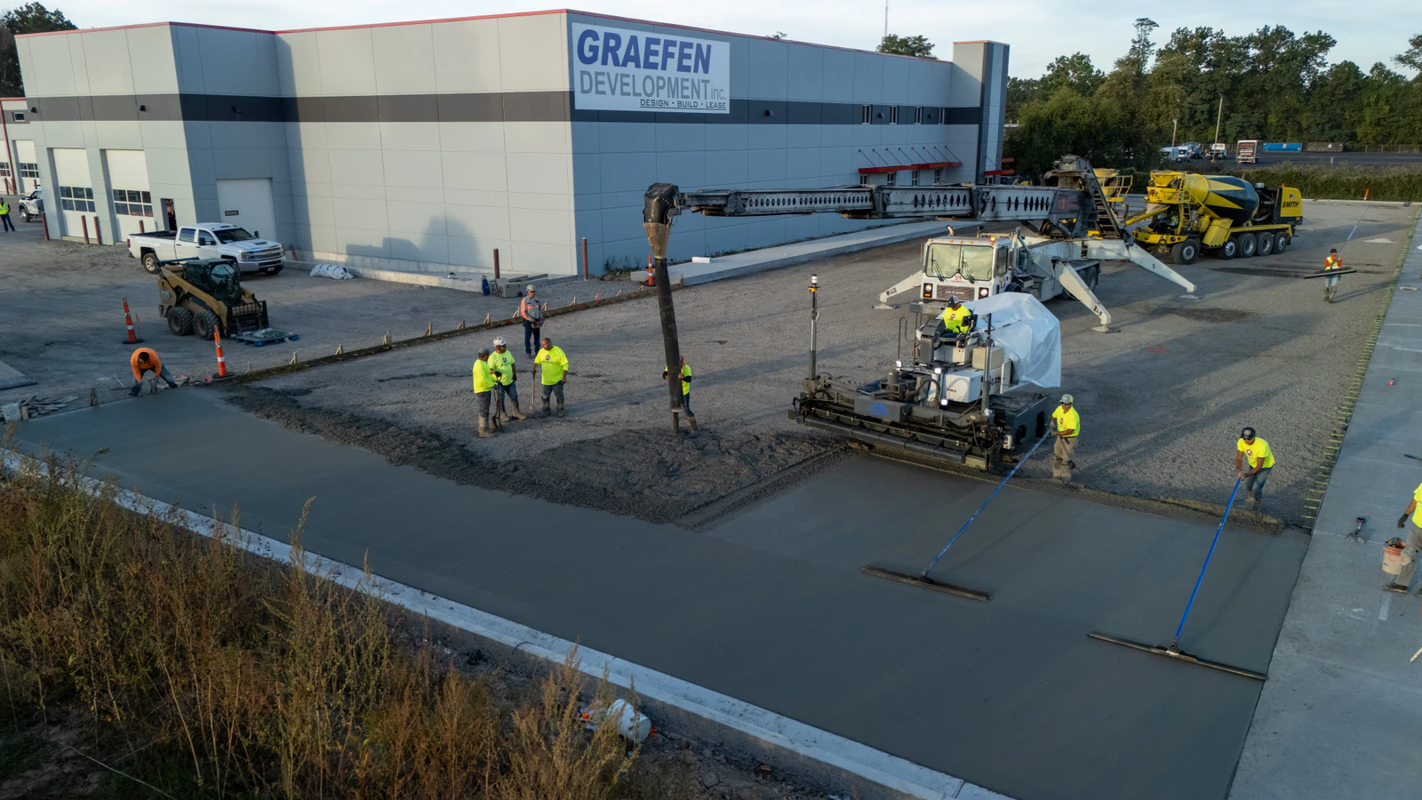 Rihm Kenworth truck dealership — excavation, grading and full-depth concrete parking lot construction by Advantage Paving