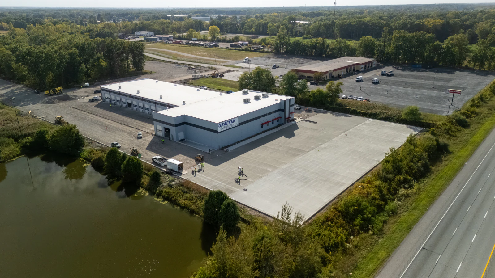 Rihm Kenworth truck dealership — excavation, grading and full-depth concrete parking lot construction by Advantage Paving