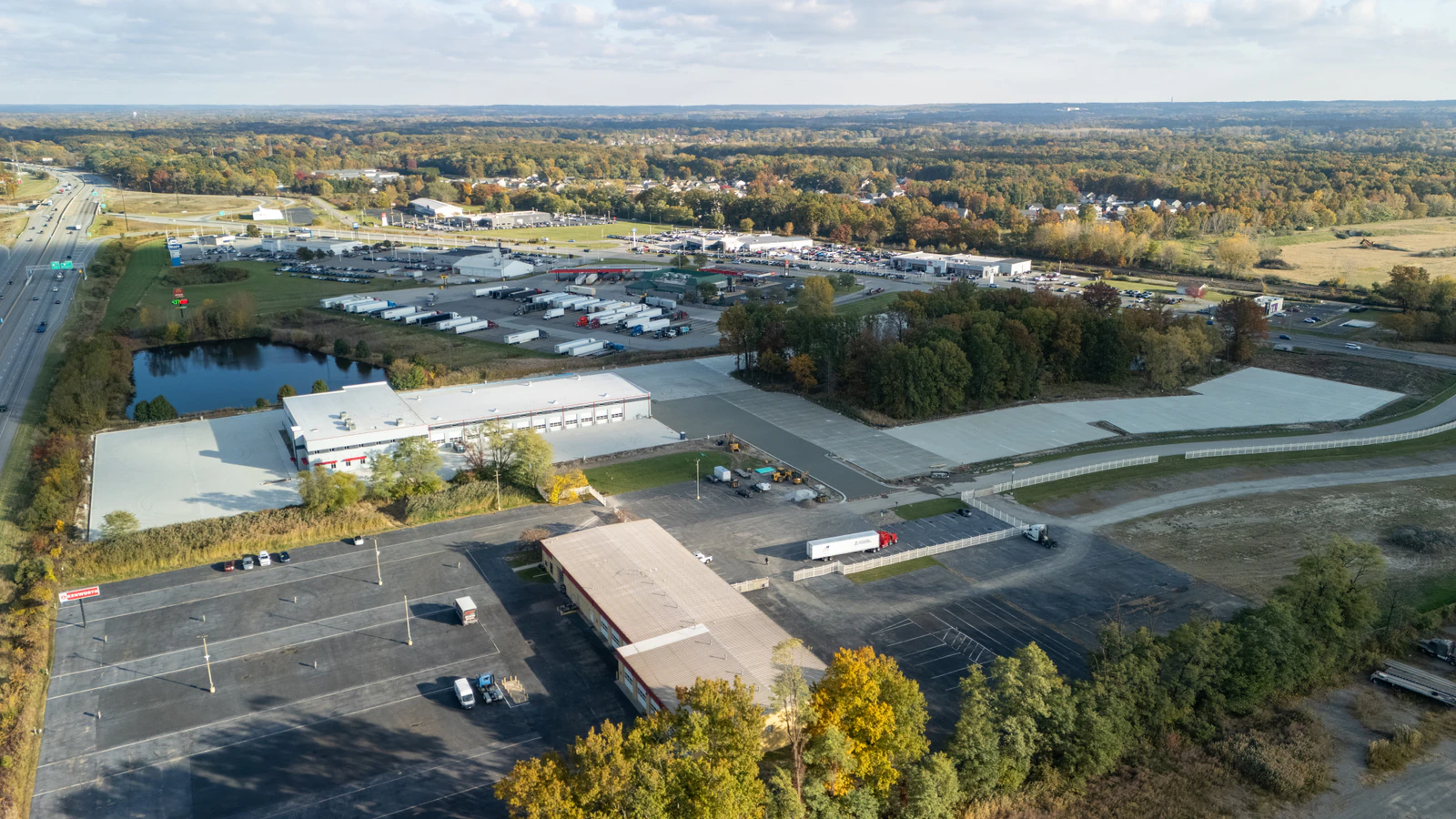 Rihm Kenworth truck dealership — excavation, grading and full-depth concrete parking lot construction by Advantage Paving