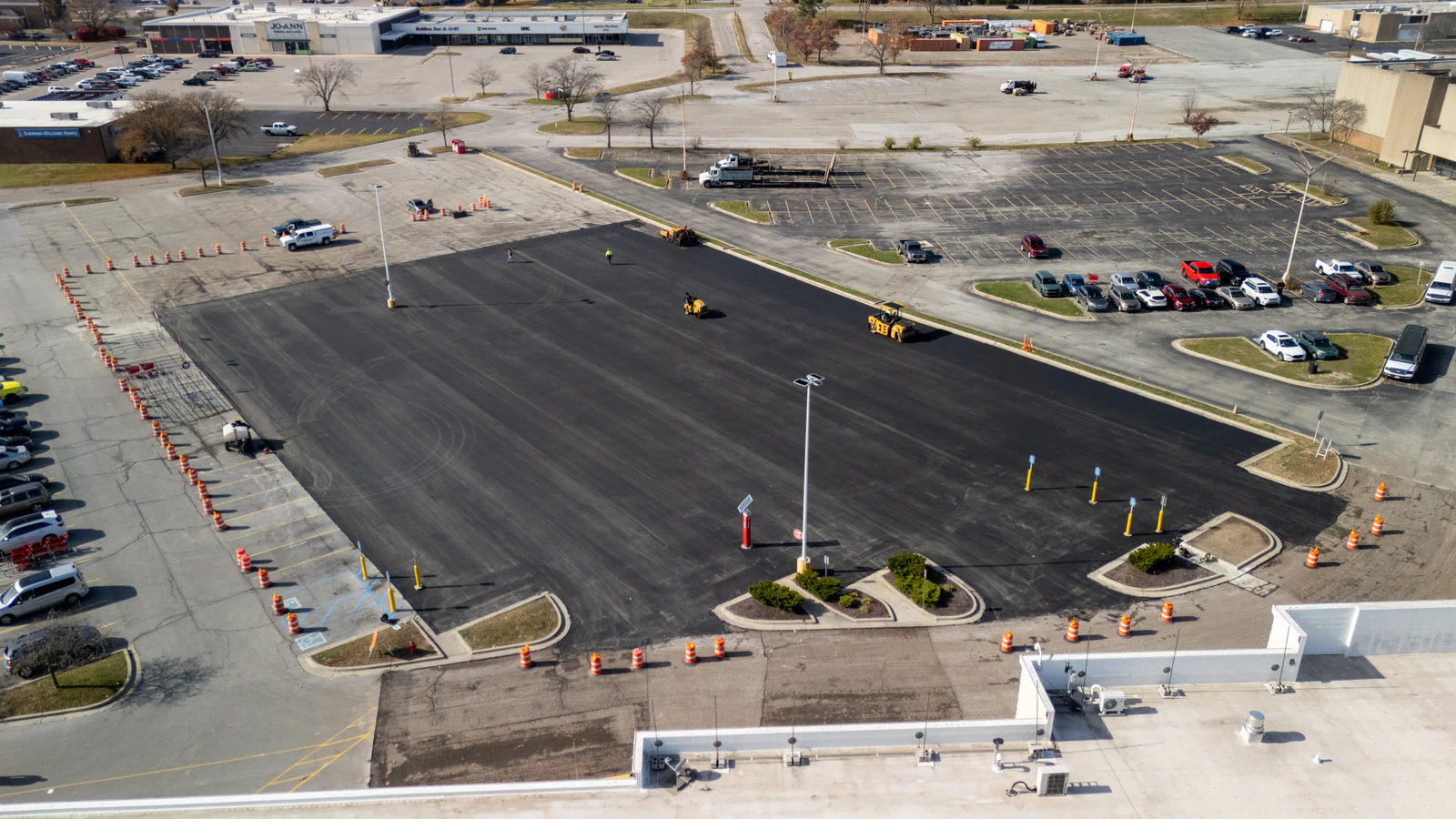 Target store emergency parking lot repair in Northern Indiana — milling, base repair, asphalt paving and striping by Advantage Paving