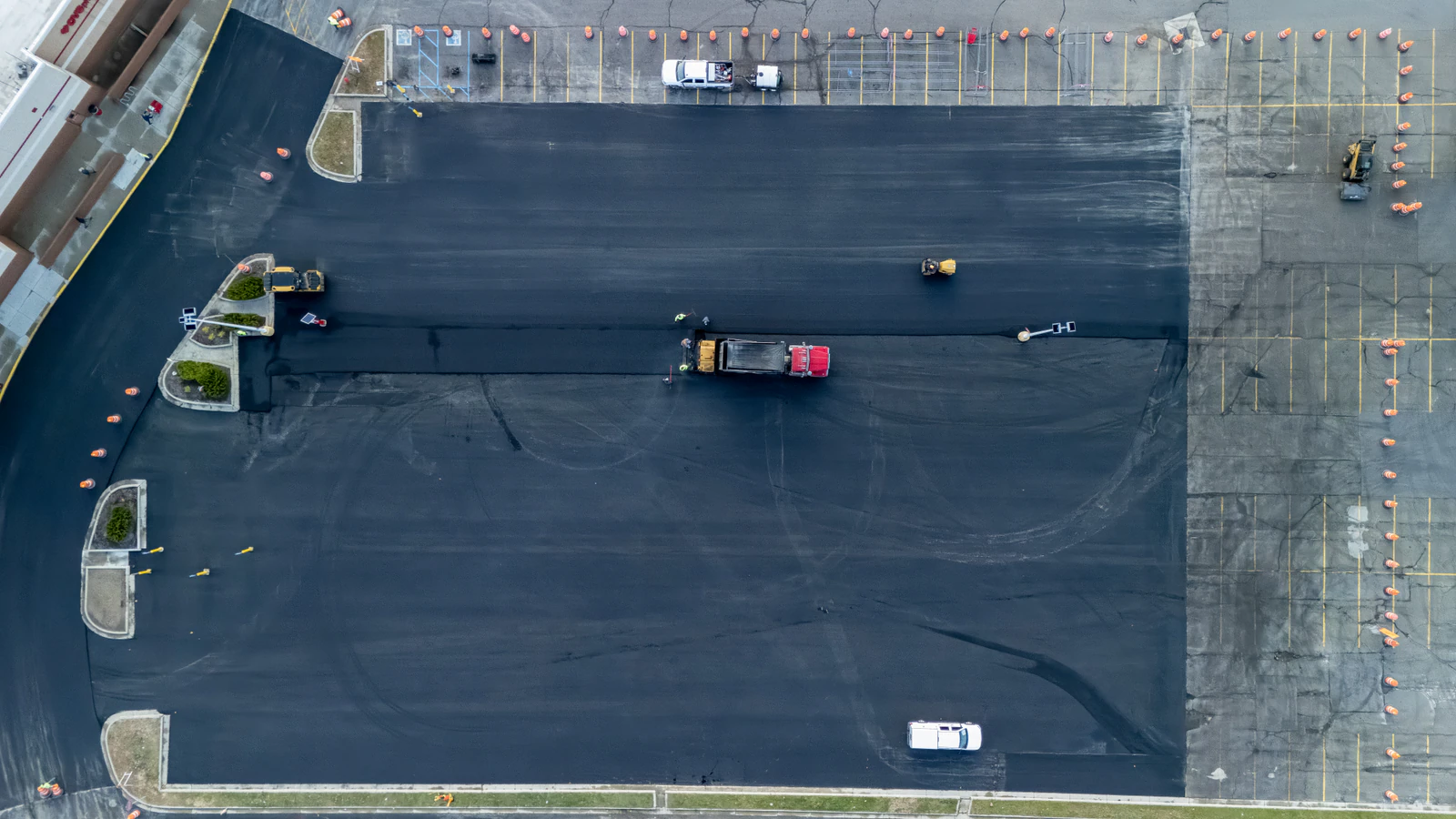 Target store emergency parking lot repair in Northern Indiana — milling, base repair, asphalt paving and striping by Advantage Paving
