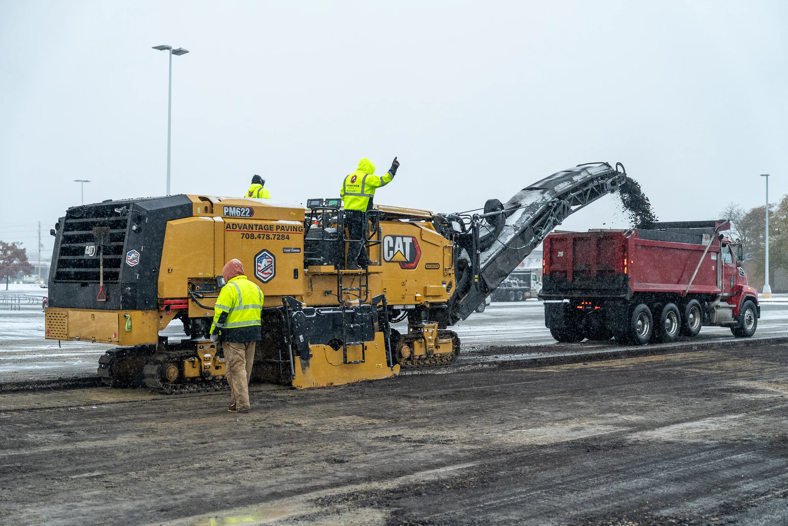 Target store emergency parking lot repair in Northern Indiana — milling, base repair, asphalt paving and striping by Advantage Paving